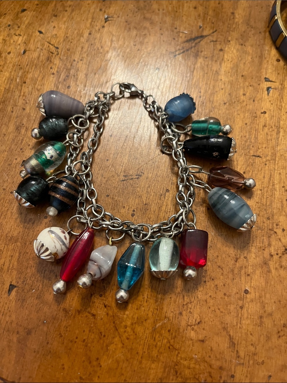 Multi-strand glass charm bracelet